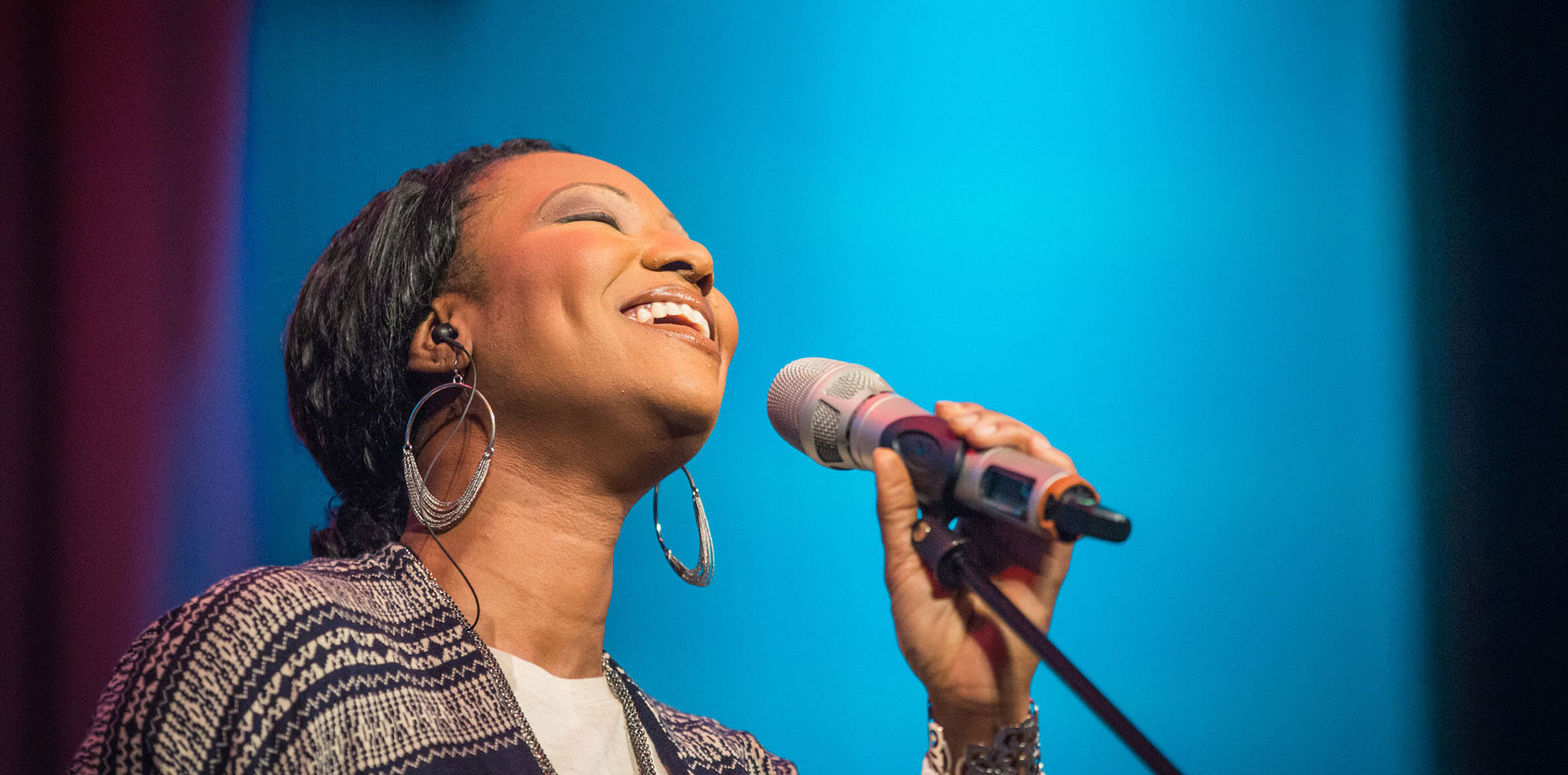 Woman leading worship songs